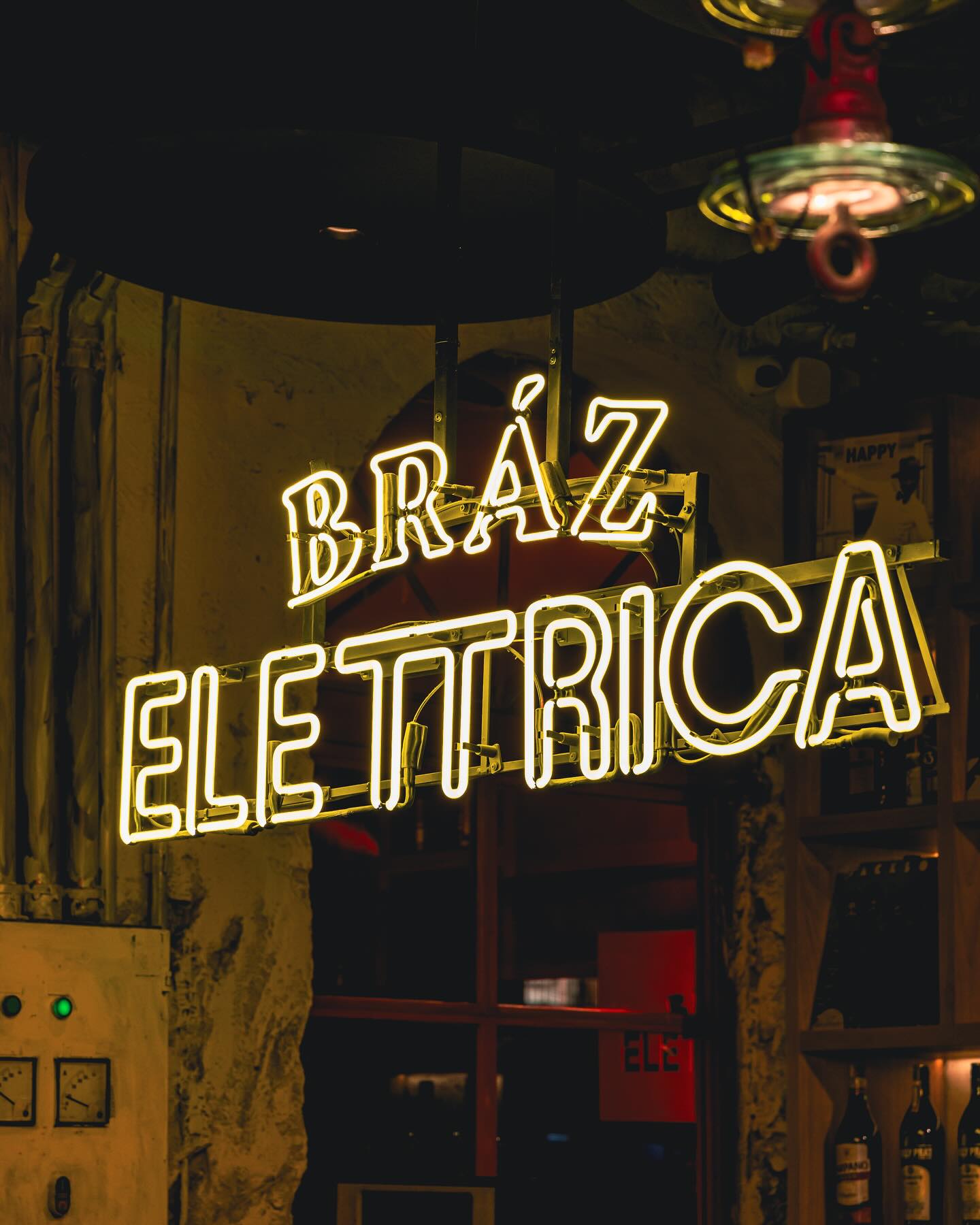 Interior neon wordmark above the bar