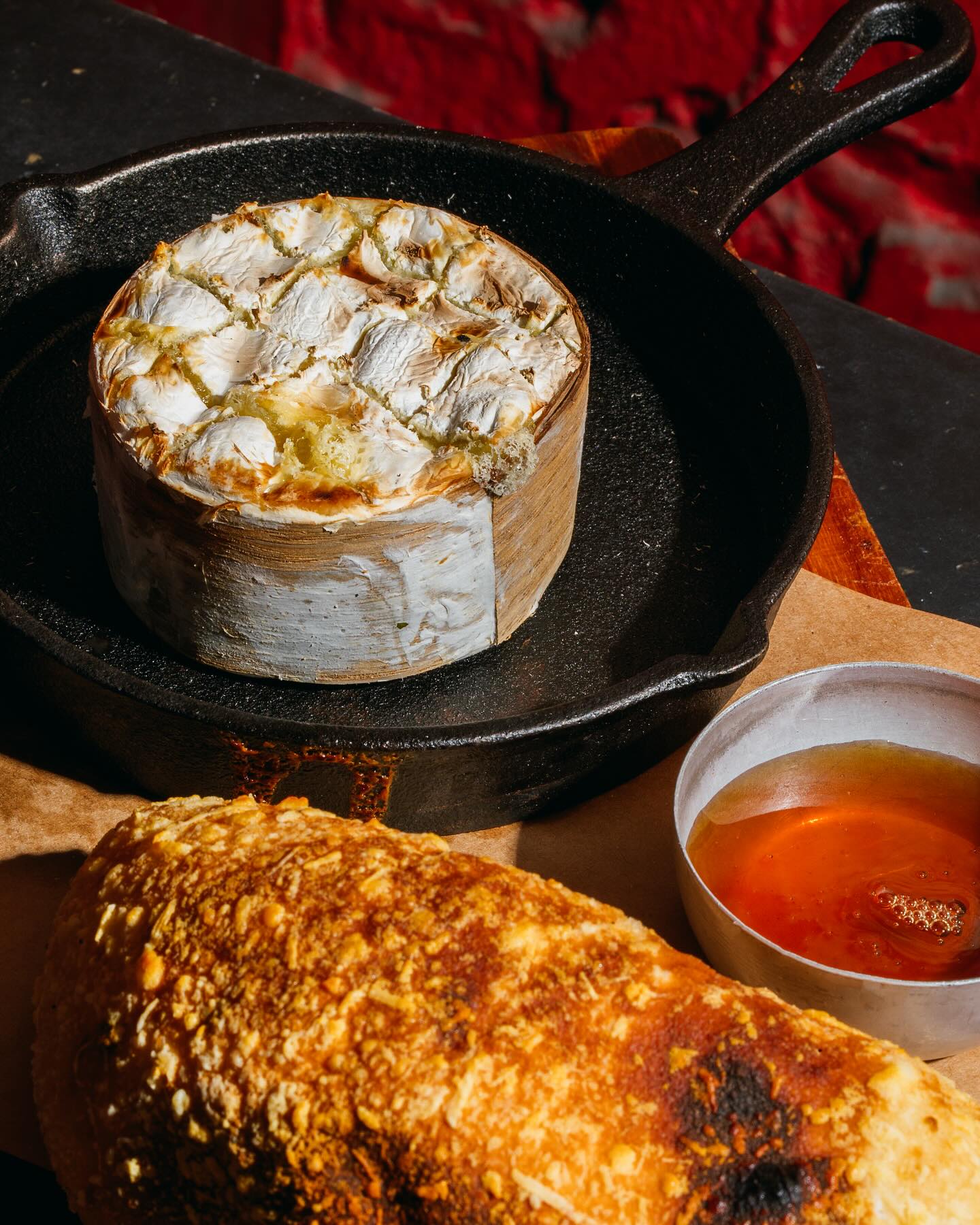 Baked cheese and bread on the table