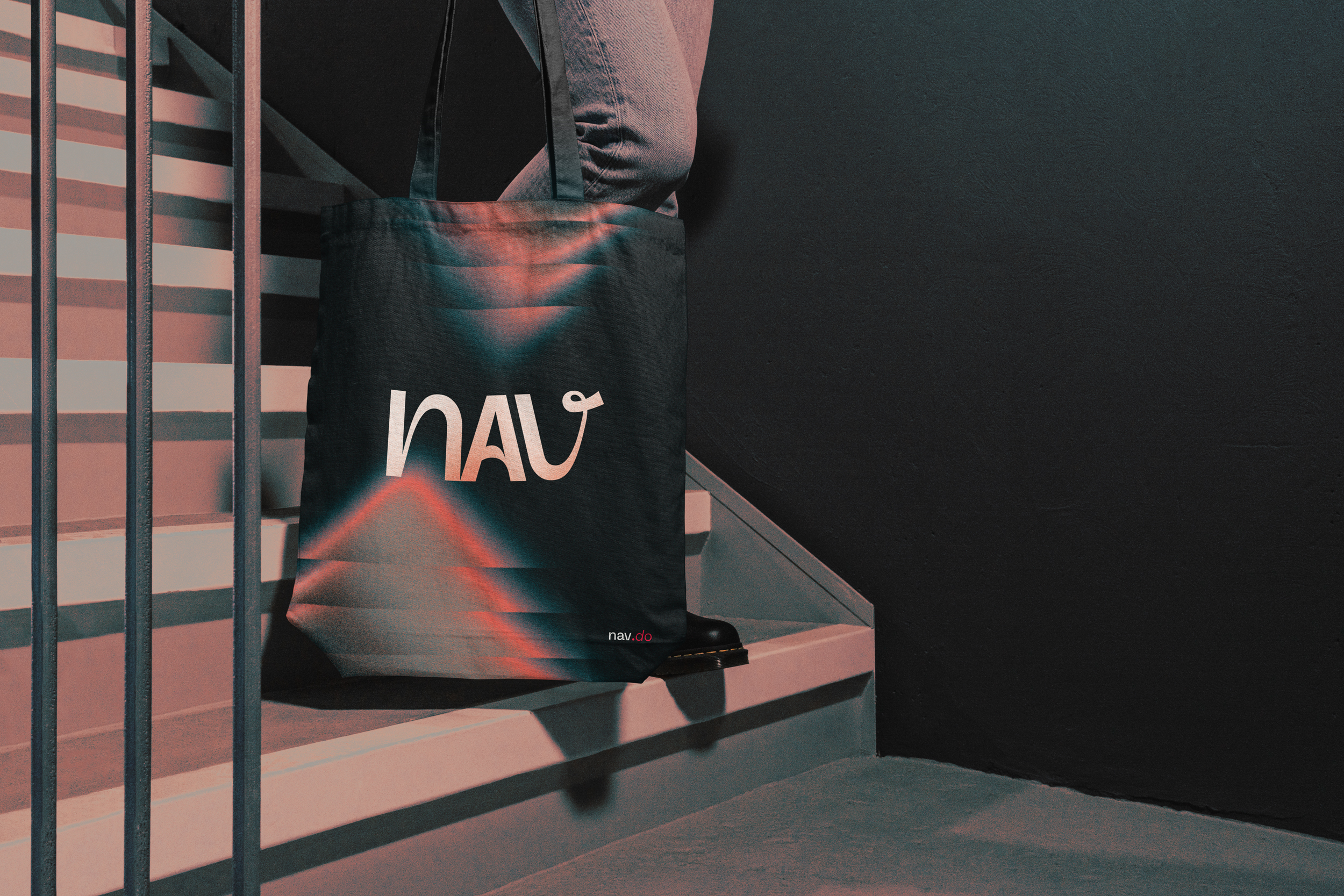 NAV tote bag photographed on outdoor steps